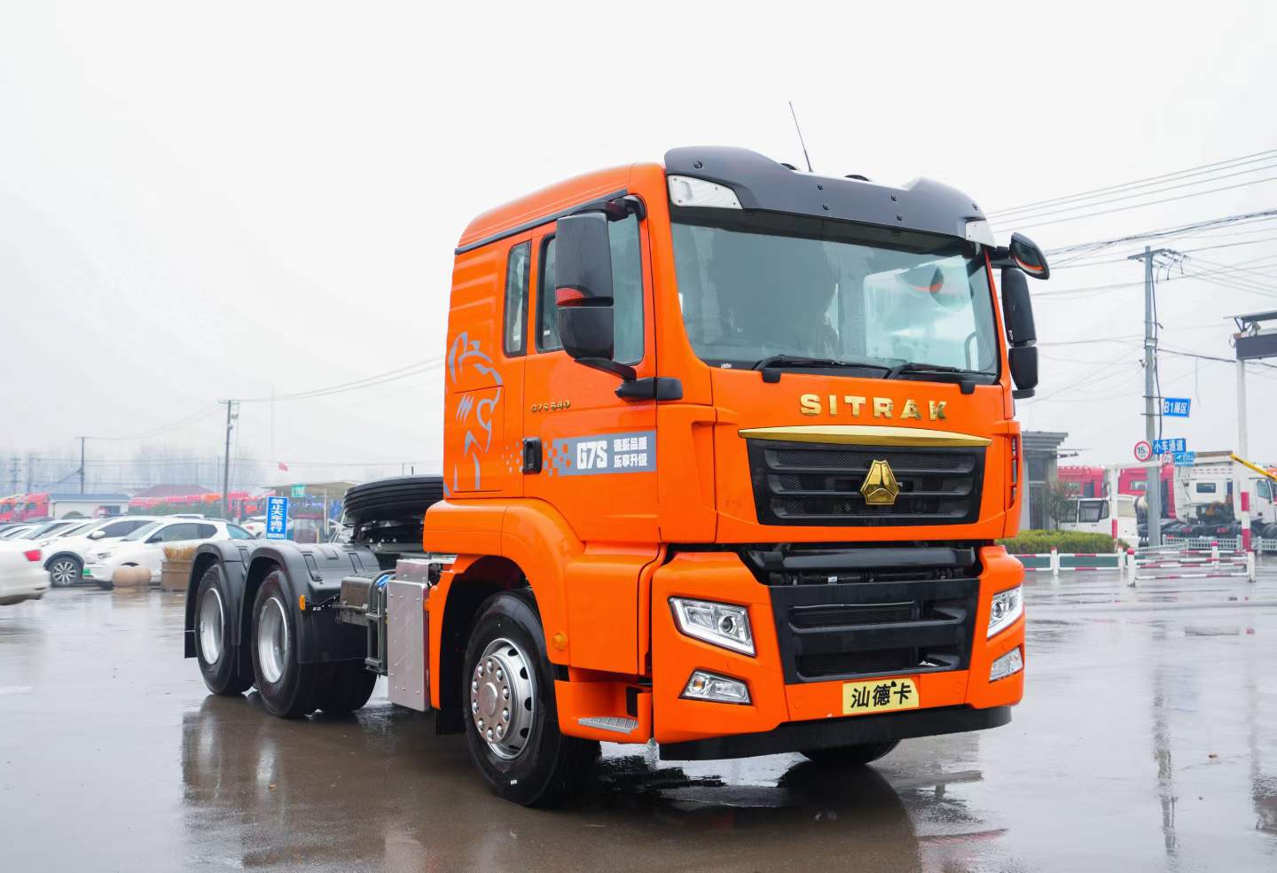 Orange SITRAK G7S 6x4 tractor truck in Ant Automobile stock