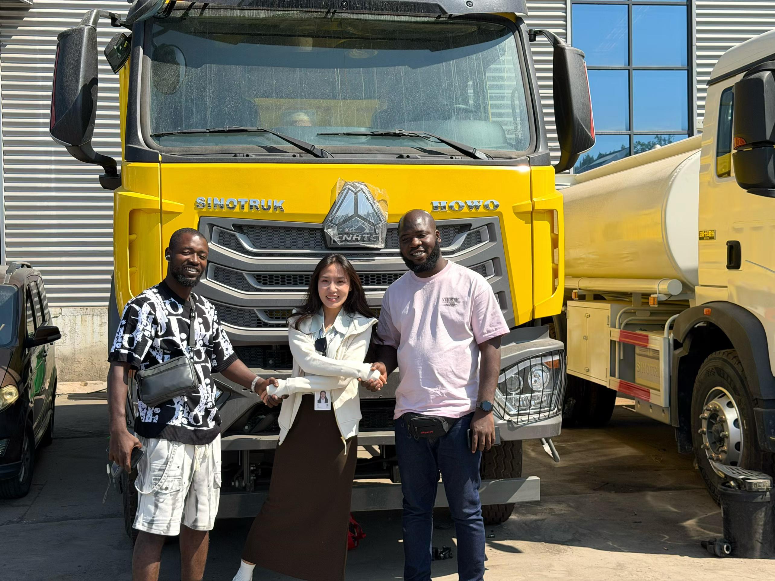 African customers visiting Ant Automobile for HOWO truck inspection in China